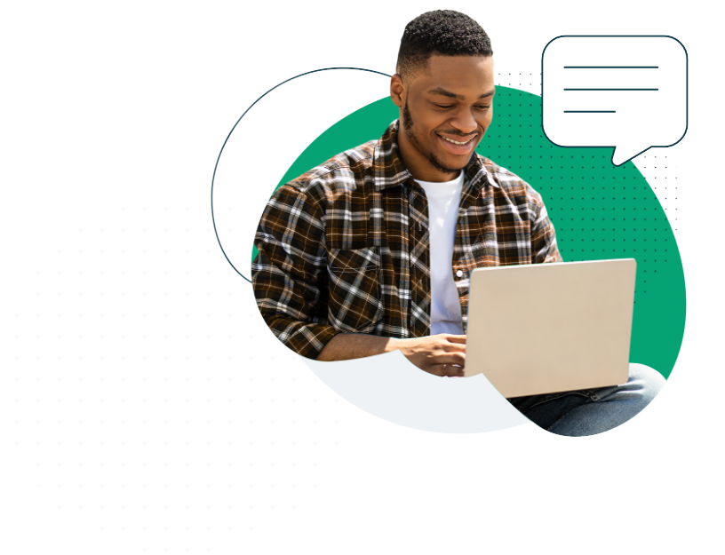 man typing on a laptop